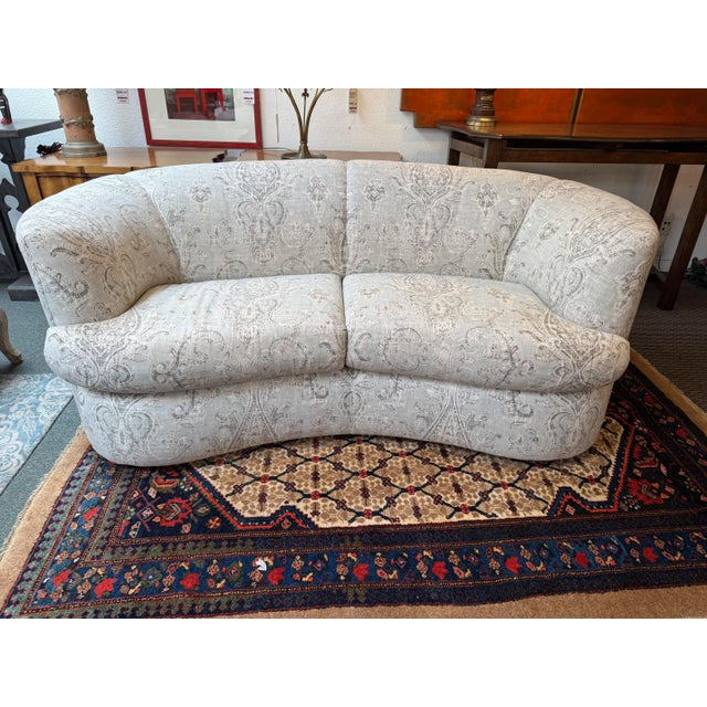 Design Plus Gallery presents a Post Modern Vladimir Kagan Sofa. The uniquely pleasant kidney-shaped sofa marries...