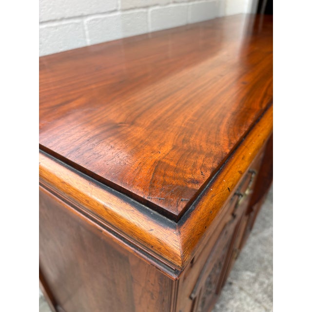 Antique Victorian Walnut Sideboard Featuring Intricate Hand Carvings and Original Ornate Brass Hardware. Late 19th...