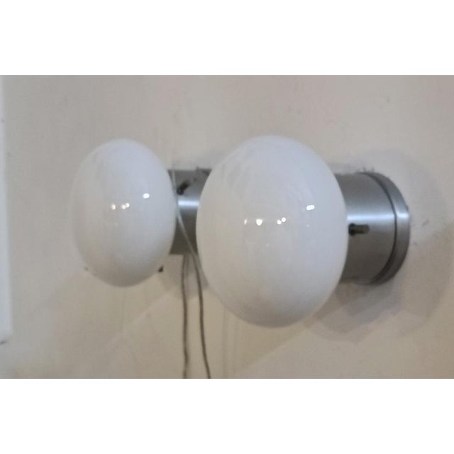 “Modulo” wall or ceiling lamps, designed by Studio tecnico Valenti & C. of Milan, originals from the 1970s. Metal body,...