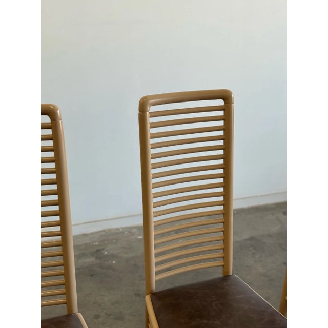 W17.5 D21.5 H42 SW16 SD16 SH18 Fully restored dining chairs in light brown lacquer and leather. Each chair is structurally...