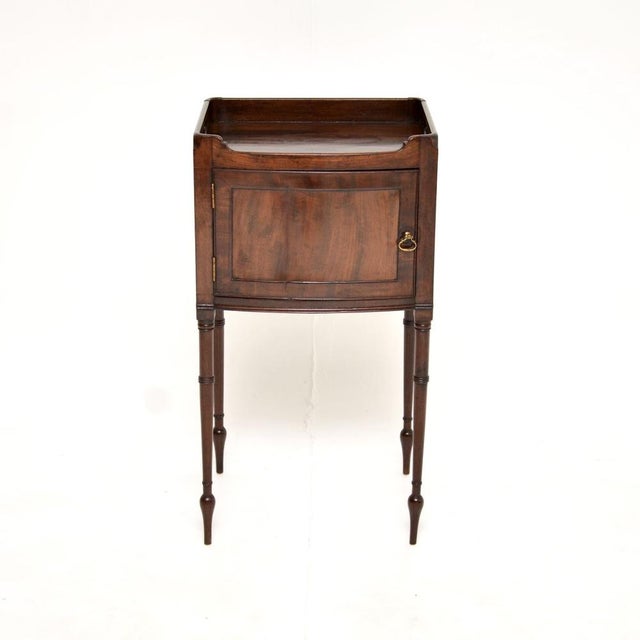 A smart and very well made antique side cabinet on legs. This was made in England, it dates from around the 1890-1910...