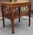 Baker Furniture Chinese Chippendale Magogany Tiered Side Table. Measures 24" in with, 18" in depth and stands 26" tall.