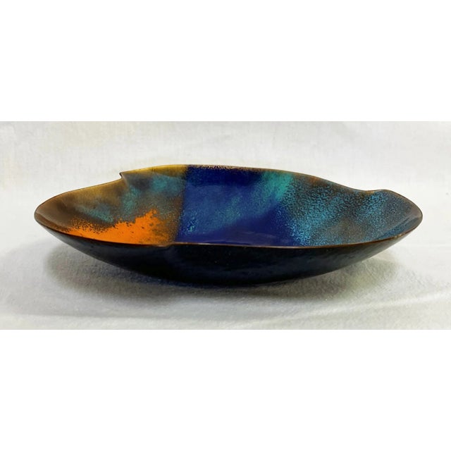 Fantastic handcrafted vintage enamel dish by Bovano. The mid-century modern piece is decorated in bright colors of enamel...