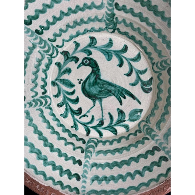 Large Spanish handmade and painted white and green glazed terracotta "Lebrillo" earthenware bowl in the style typical of...
