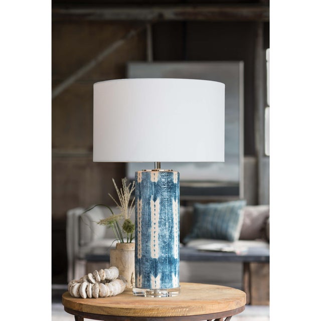 Master artisans produce a fresh and modern take on the classic blue and white look of the Mali ceramic table lamp. The...