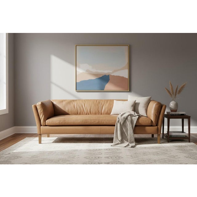 This Restoration Hardware Sorensen Sofa combines clean modern lines with the warm character of beautifully aged tan...