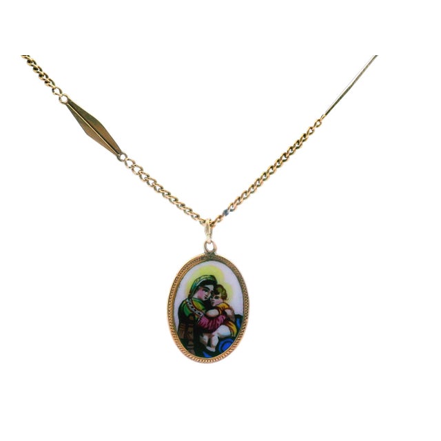 This gorgeous Mother Maria pendant was made in the early 1900s. The pendant is set in a 18k yellow gold mounting and comes...