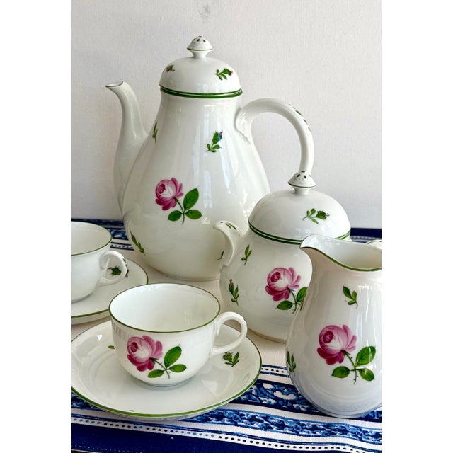Augarten Wien porcelain tea set in the classic Viennese tradition. Featuring a teapot, covered sugar bowl, creamer, and...