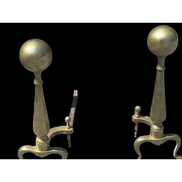 Beautiful, solid, brass andirons and fireplace screen. The set is 100 years old and an excellent condition. The screen...