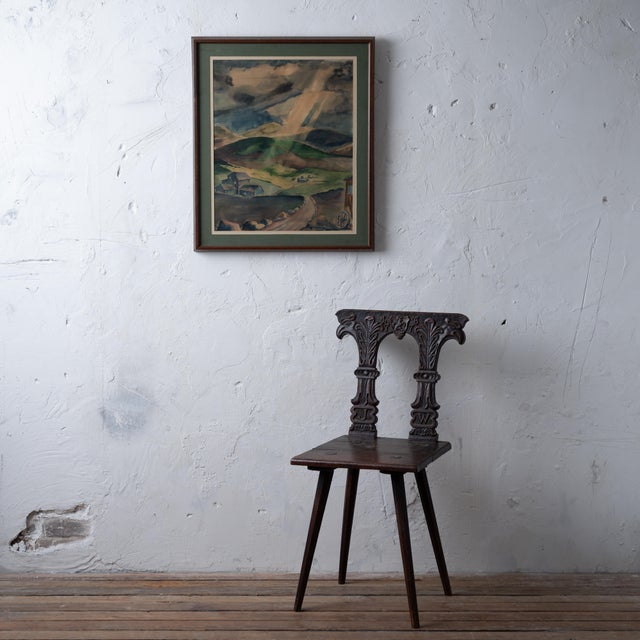 A watercolor landscape depicting a farm in the Icelandic countryside. The painting was a gift from the artist Thomas B....