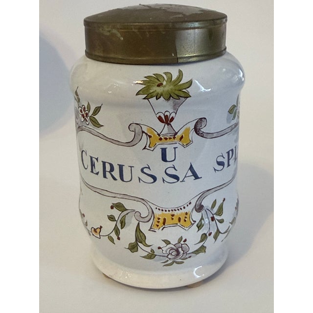 19th Century French Faience Apothecary Jars – Set of 7 – Hand Painted Pharmacy Canisters With Brass Lids For Sale - Image 4 of 9