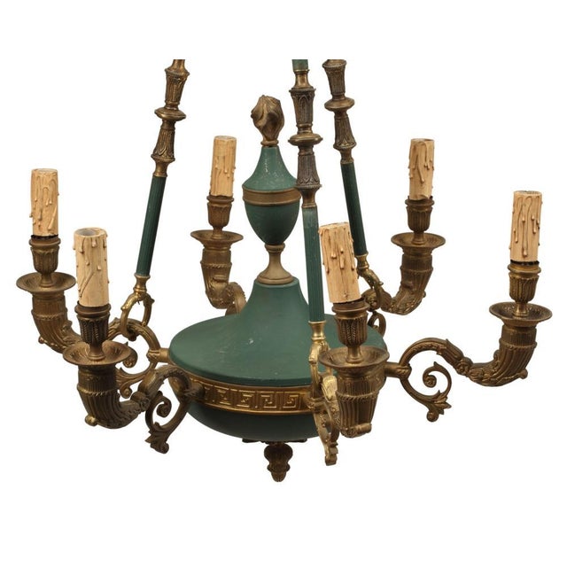 A pair of French Empire style bronze doré and tole six light chandeliers, approximately 34 inches high, 24 inches in...