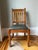 A lovely set of six Stickley oak cottage dining chairs with upholstered dark green leather seats. Purchased directly from...