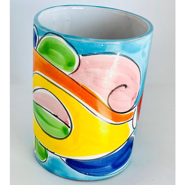 A fabulous, vibrantly colored La Musa fish vessel that could be used as a planter, to hold kitchen utensils, a vase, or a...