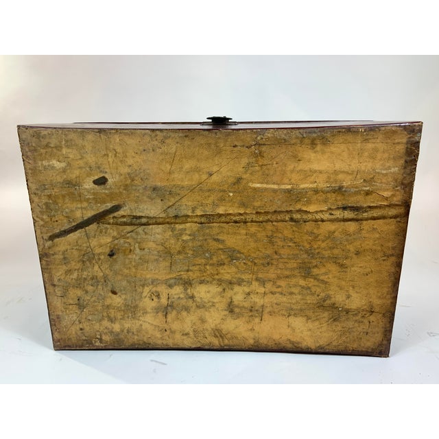 Late 19th Century Chinese Export Painted Leather Chest on wood stand. Deep red paint on leather wrapped wood trunk/chest....
