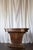 This striking pair of 1930s French Art Deco demilune tables showcases dramatic wood grain with a rich, warm finish. The...