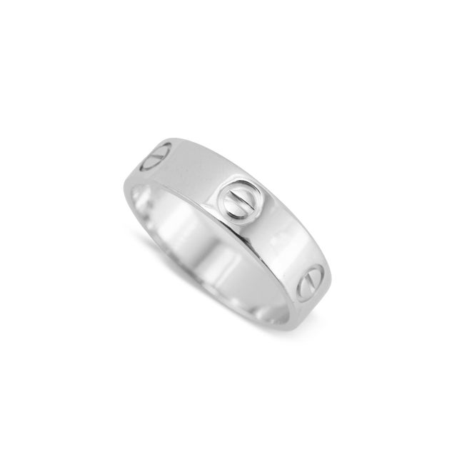 Brand: Cartier Gender: Ladies Metal Type: 18K White Gold Ring Size: 10 Width: 5.50 mm Weight: 7.06 grams Cartier Men's...