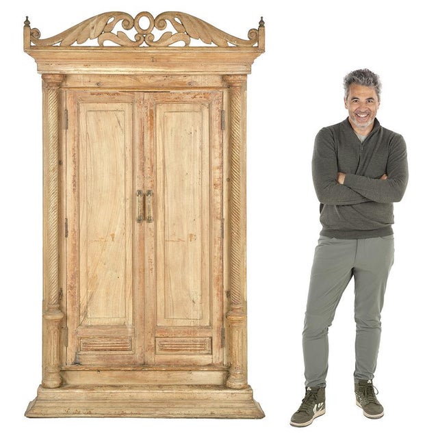 Majestic and steeped in history, this antique Indian solid wood door stands out for its remarkable proportions and refined...
