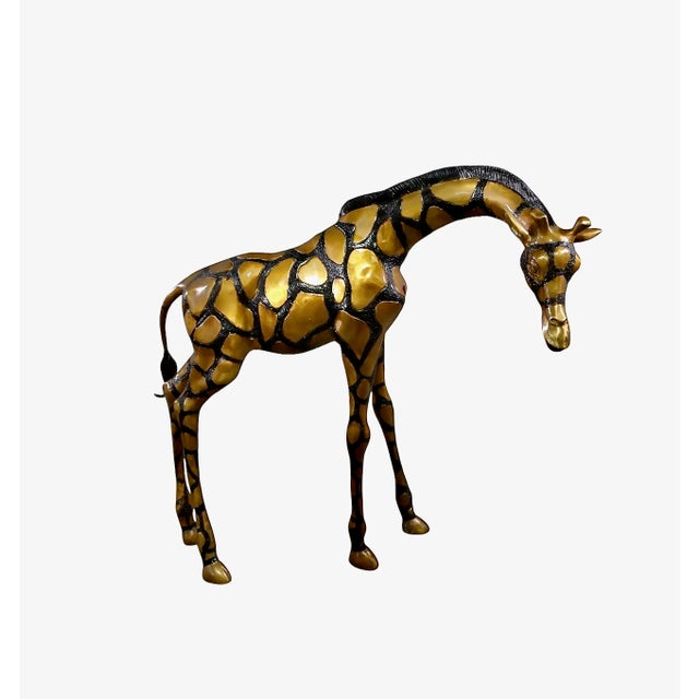 This is a superb pair of late 20th century tall brass giraffes in the style of Sergio Bustamante. The tallest giraffe...
