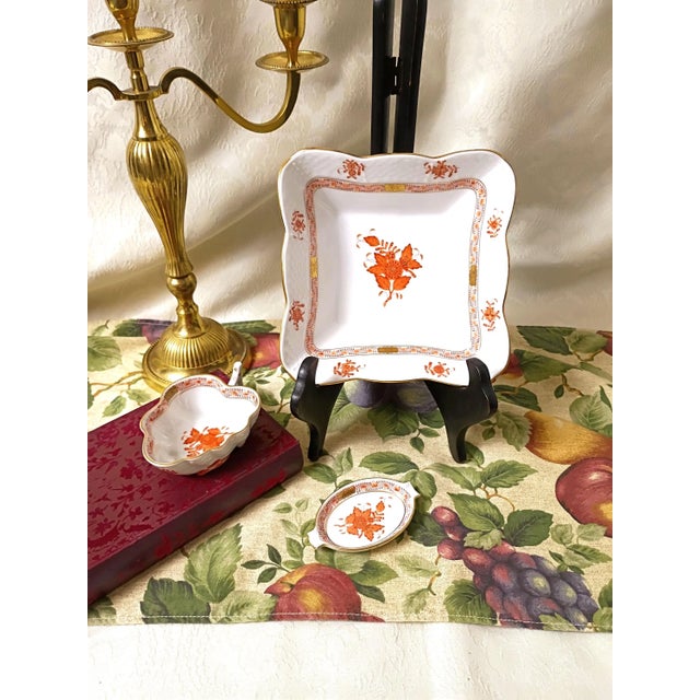 This pristine authenticated square porcelain fruit and salad bowl, handcrafted by Herend Hungary in the globally coveted...