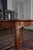 The table is hand-carved from solid oak. The top and side are decorated with molding. The legs in the shape of doe legs...