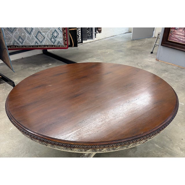 French Country Carved Dining Table in a Round Design and seats Eight to Ten People. Table is from the Heritage Furniture...