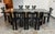 Design Plus Gallery presents a Vintage Black Lacquer Extension Dining Table + Eight Chairs by Pierre Cardin from Roche...