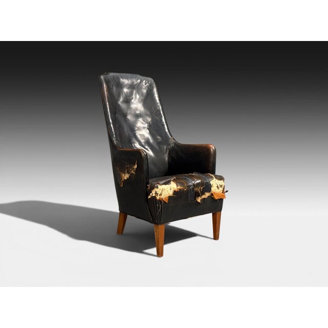 Svend Åge Madsen, Danish Mid-Century Modern, Highback Chair, Leather, Nut Wood, Denmark, 1947 An impressive highback chair...