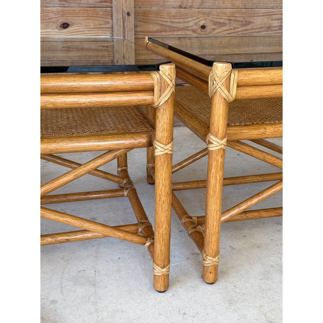 Camel Pair of Vintage McGuire Organic Modern Rattan Side Tables With Cane Shelves and Glass Tops For Sale - Image 8 of 12