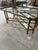 Regency style faux Bamboo glass with heavy brass rim… A unique coffee table for an elegant setting. The patina is...