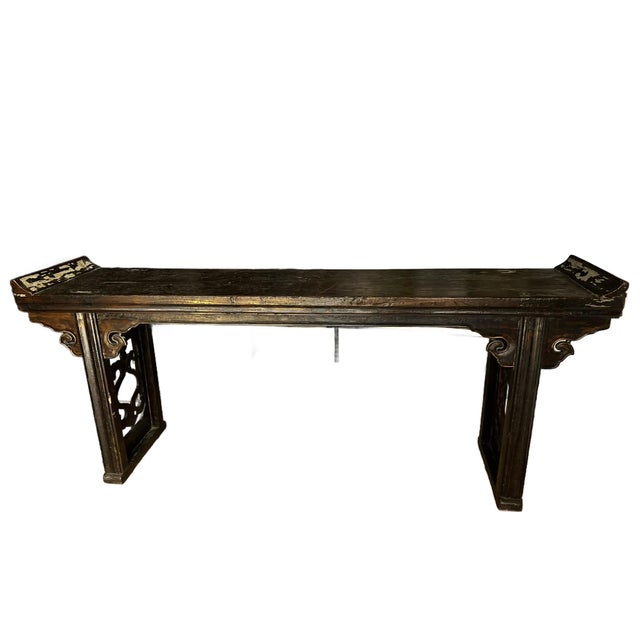 This is a traditional Chinese altar table from Shanxi Province. It is almost 200 years old. It has the single board table...