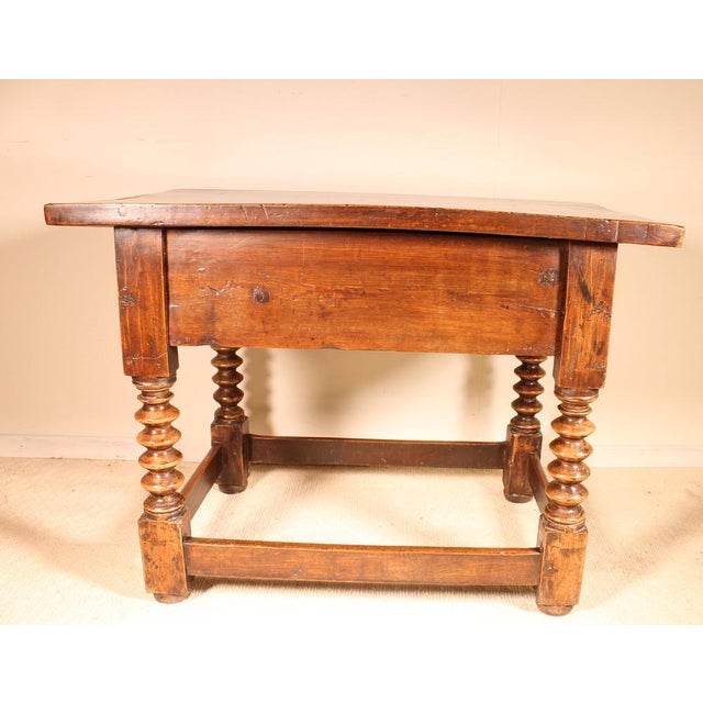 Spanish Renaissance walnut table circa 1600 Sublime small table with a beautiful large walnut top. Very interesting base...