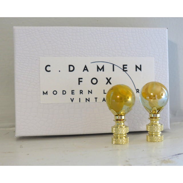 Blown Murano Glass Table Lamp Finial. Cat's Eye Gold, Clear, Swirl Brass Bases, a pair Materials: Glass Width: 1 inches...