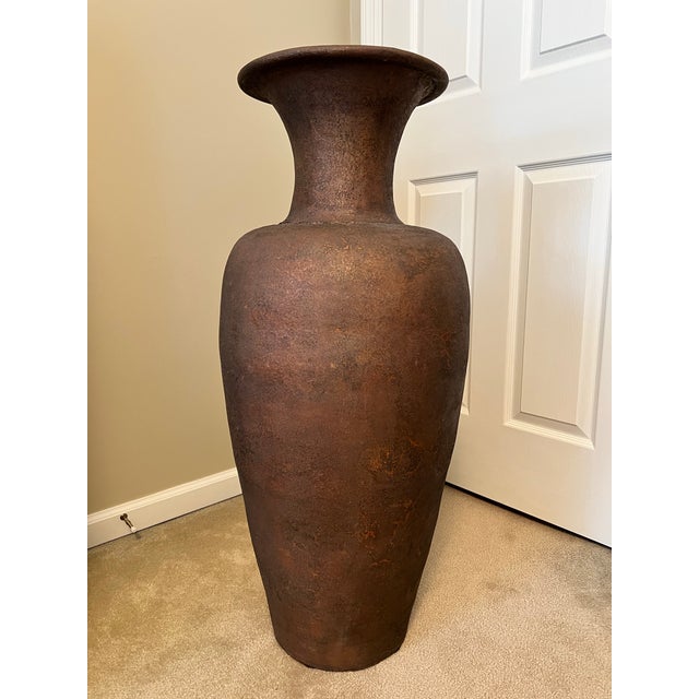 A beautiful organic textured floor vase / extra large vessel made by “Montaage.” The glaze color is called Umbria Plum....