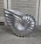 A striking sculptural champagne cooler cast in aluminium in the form of a large nautilus shell. The beautifully modelled...