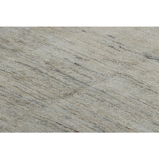 Hand-knotted in a luxurious blend of all-natural silk, this 10x17 textural rug is an exciting new addition to the Texture...