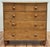Stunning 19th Century Victorian English pine chest of drawers. Two over three drawers. Features a natural medium finish,...