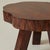 Solid wood table made with a cross section of a tree trunk, 1950's. Shows the gorgeous natural grain of the wood, which is...