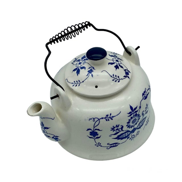 Has a Delft-look or French Country…can work with Shabby Chic, Traditional or Cottage decor. Beautiful piece