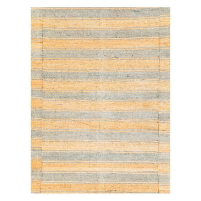 A vintage Turkish flat-weave Kilim accent rug handmade during the mid-20th century with a striped design offset on 3...