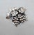 Circa 1960s silvertone repoussé grape cluster with dye to give a 3d look with leaves brooch with security clasp. Marked...