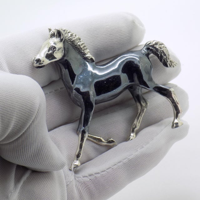 Beautiful vintage sculpture portraying a darkened horse, handmade in Italy between the 1980s and 1990s in genuine solid...