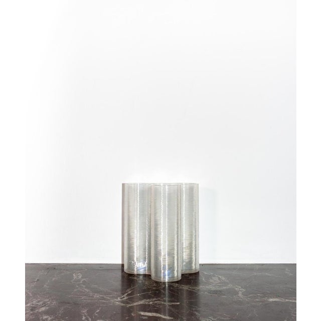 Transparent splash vase by mana dimensions: d 16 x w 12 x h 18.5 cm. Materials: recycled pet from post-consumer plastics,...