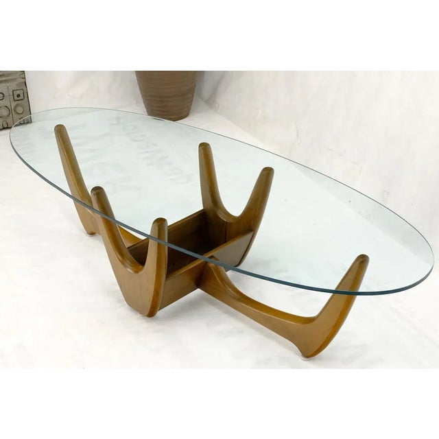 Mid-Century Modern oval glass top coffee table Pearsall, Noguchi, Kagan decor match. Organic forms solid wood base.