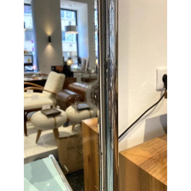 Original chromination in good condition with patina. The original paint was cleaned.