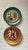 This pair of mid-century Swiss folk art wall plates is attributed to Heimatwerk Basel, a renowned workshop known for...