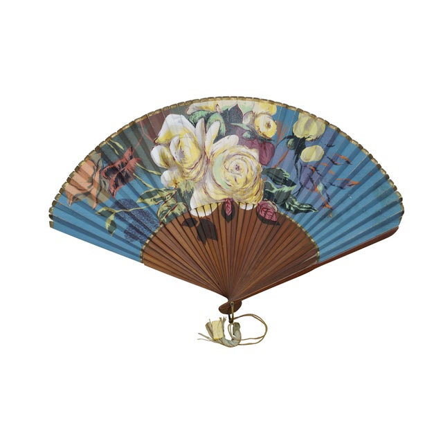 Five vintage and antique folding hand fans featuring a variety of designs. Includes: - Antique French fan with handpainted...