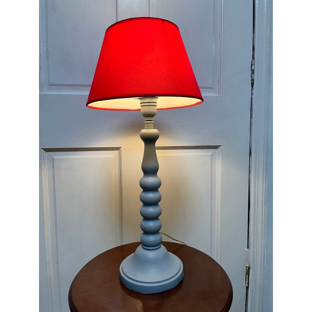 unique vintage red shaded lamp with blue gray painted stacked bubble base. Base has some ware/imperfections in paint. 90s...