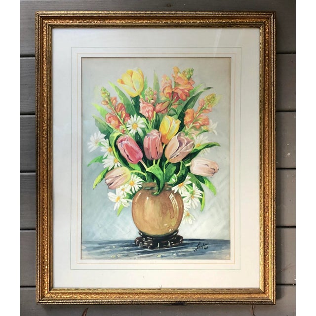 A numbered Schumacher botanical still life print. This wonderous watercolor print features tulips, snapdragons, and aster...