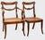 Set of ten rare and fine period Regency chairs in carved mahogany. Neoclassical draped form with applied ormolu mounts of...